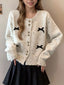Bow Button Up Ribbed Hem Cardigan