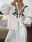 Embroidered Notched Long Sleeve Blouse