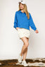 Umgee Collared Neck Long Sleeve Top with Raw Hem Detail